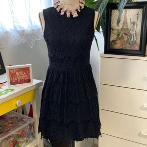 Black dress|sleeveless, fully lined. Full zip back. Raw neckline and bottom hem.